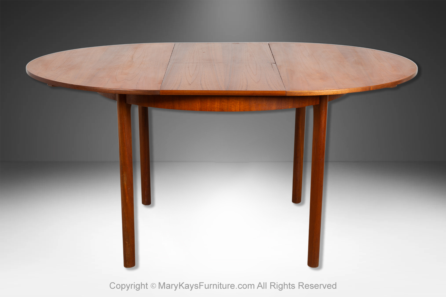 1b595941-b6fc-4c0e-bac9-24dc1c4e3203_Mid-Century-teak-Oval-Extendable-Dining-Table-by-McIntosh-of-Kirkcaldy-11.jpg