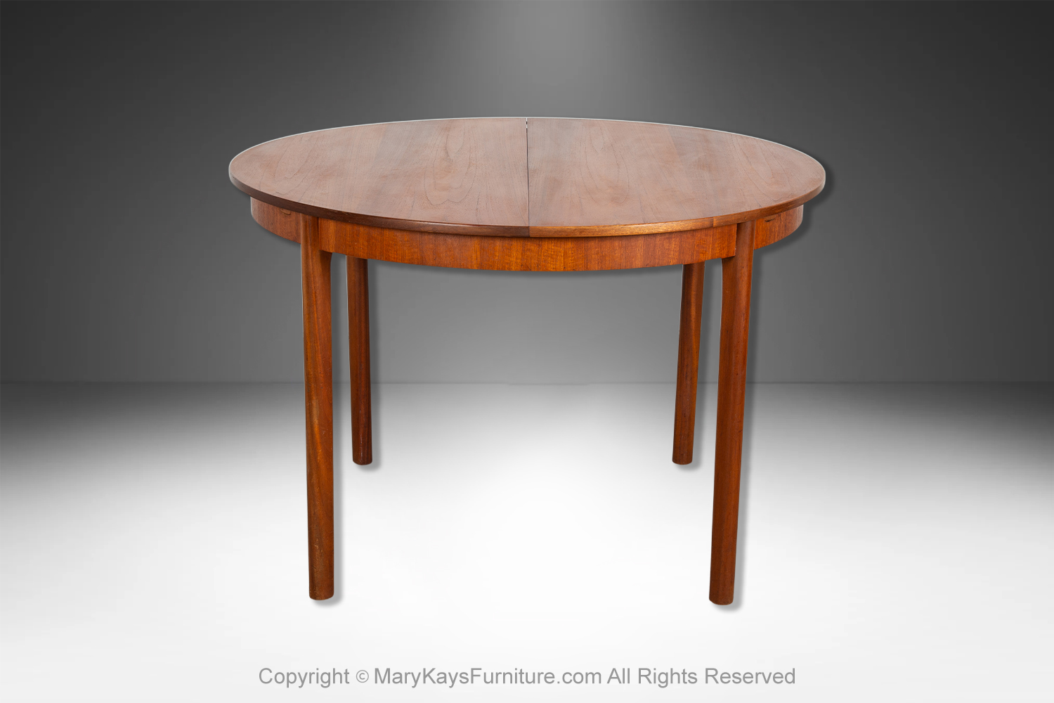 1b595941-b6fc-4c0e-bac9-24dc1c4e3203_Mid-Century-teak-Oval-Extendable-Dining-Table-by-McIntosh-of-Kirkcaldy-2.jpg