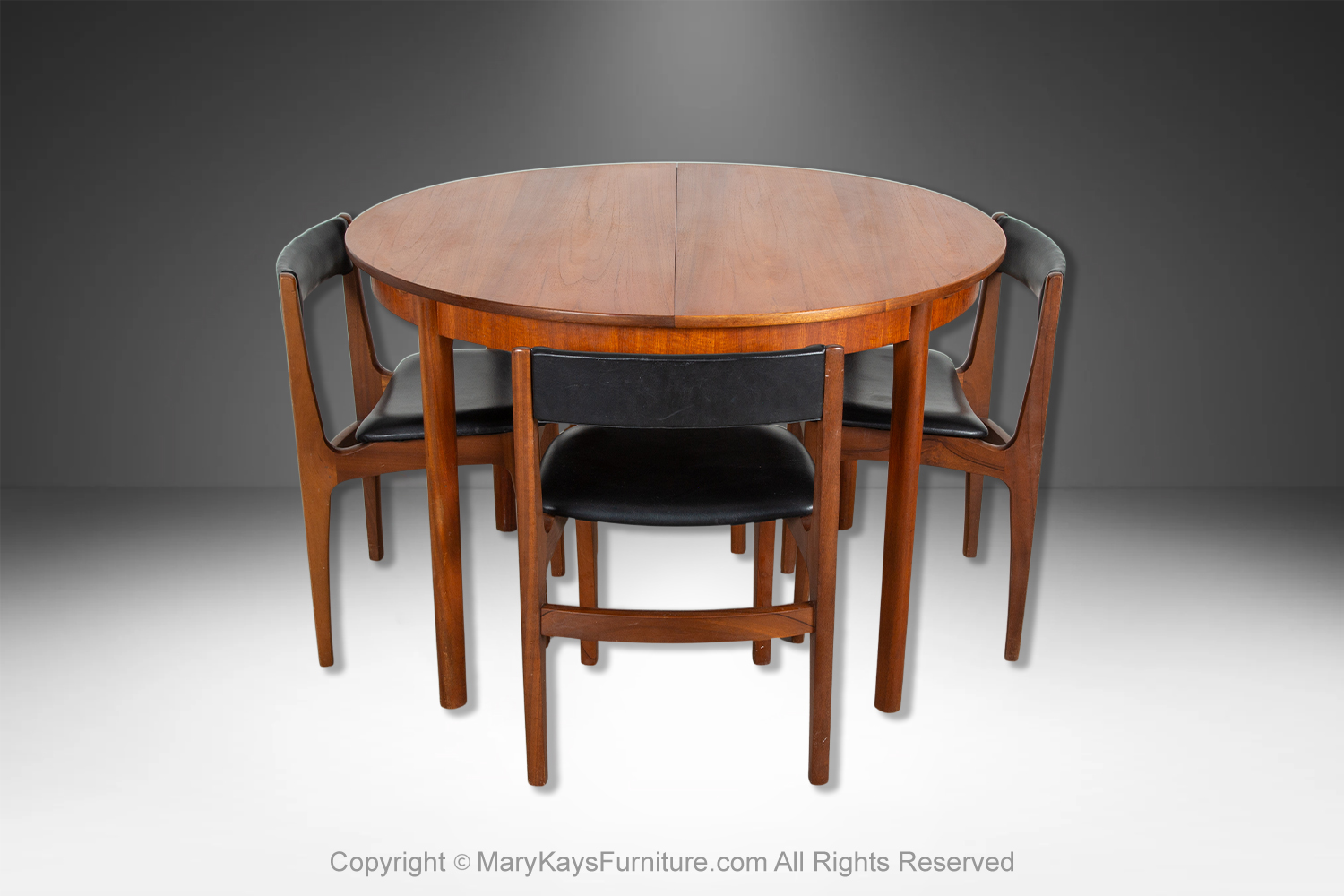 1b595941-b6fc-4c0e-bac9-24dc1c4e3203_Mid-Century-teak-Oval-Extendable-Dining-Table-by-McIntosh-of-Kirkcaldy-3.jpg