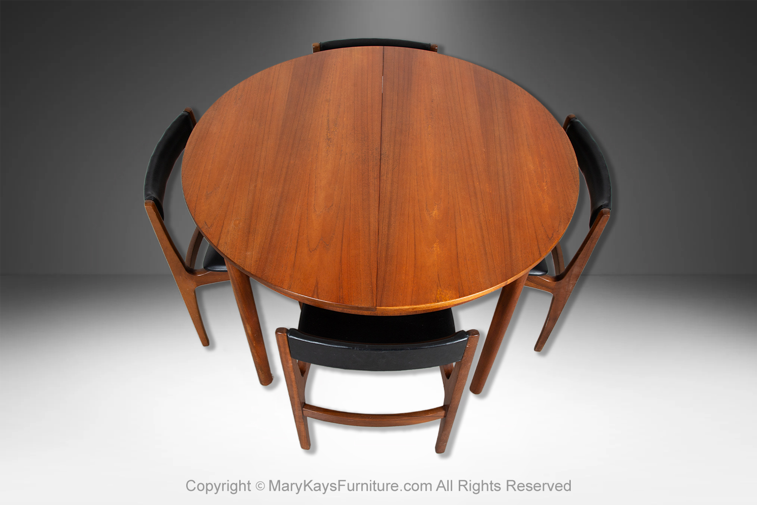 1b595941-b6fc-4c0e-bac9-24dc1c4e3203_Mid-Century-teak-Oval-Extendable-Dining-Table-by-McIntosh-of-Kirkcaldy-4.jpg