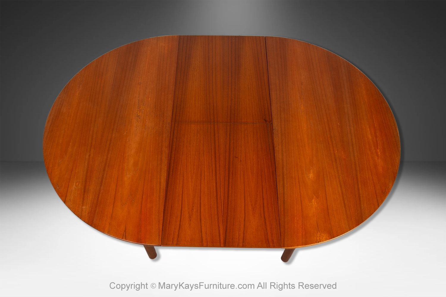 1b595941-b6fc-4c0e-bac9-24dc1c4e3203_Mid-Century-teak-Oval-Extendable-Dining-Table-by-McIntosh-of-Kirkcaldy-7.jpg