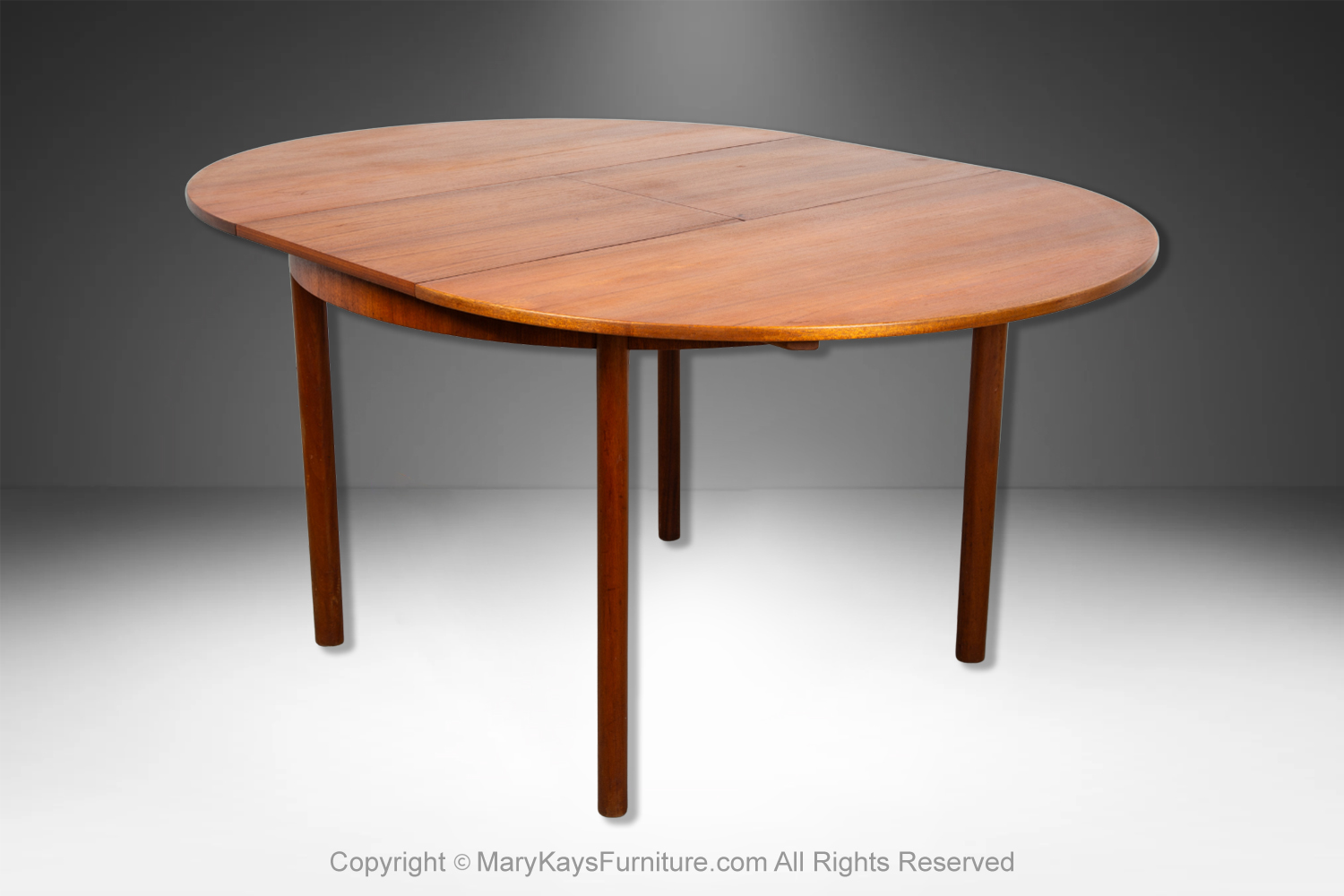 1b595941-b6fc-4c0e-bac9-24dc1c4e3203_Mid-Century-teak-Oval-Extendable-Dining-Table-by-McIntosh-of-Kirkcaldy-9.jpg
