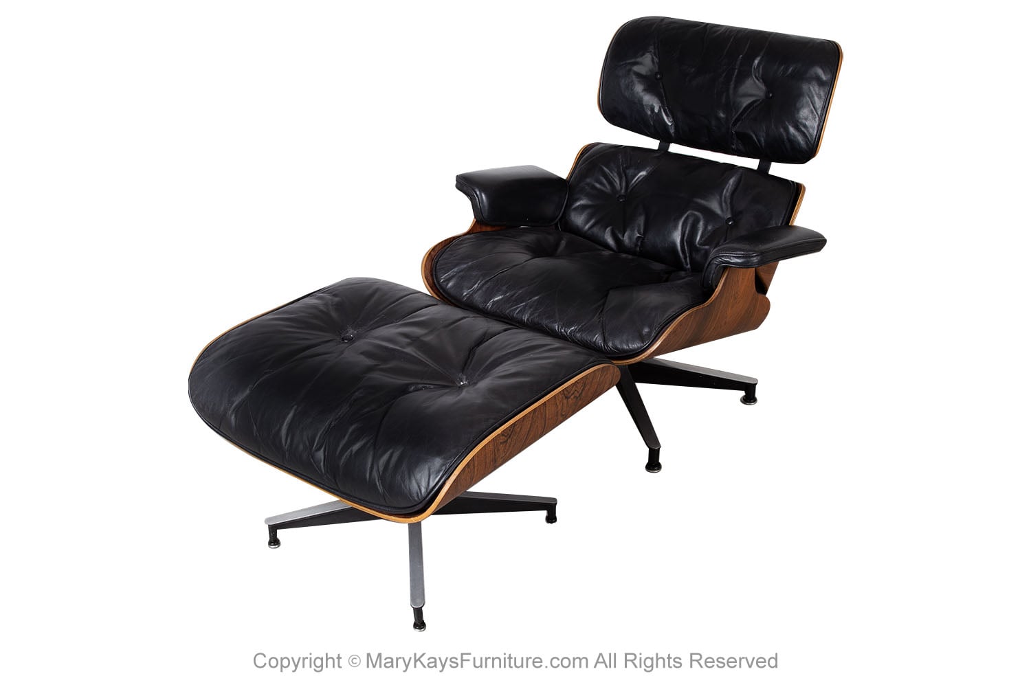 2db56476-81a0-4368-b6ee-49993591491b_Mid-Century-Charles-Ray-Eames-Herman-Miller-Lounge-Chair-Ottoman-1-main.jpg