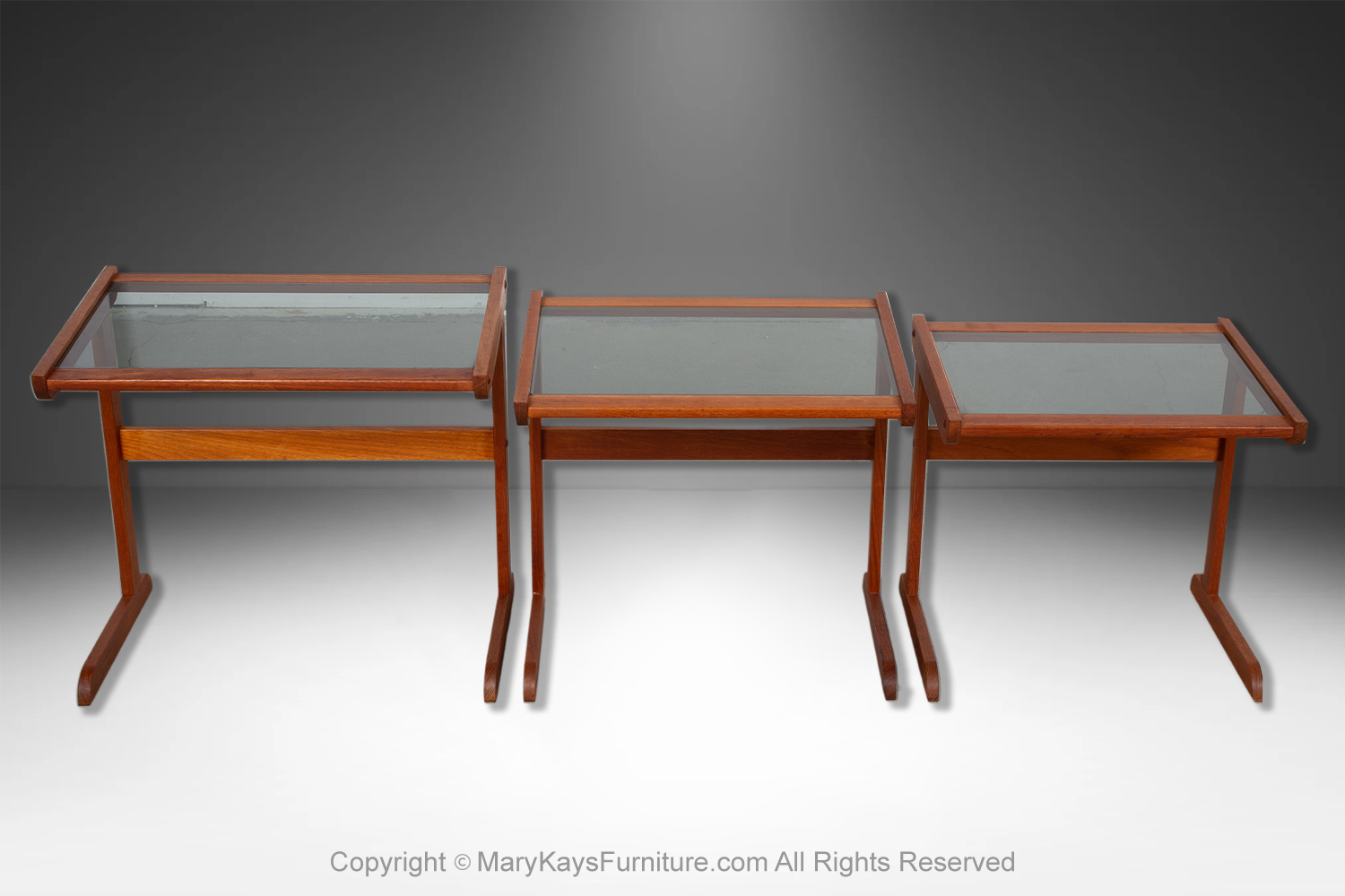 ddb90716-acc0-47dc-b7c4-6aeda8469a7d_Danish-Mid-Century-Teak-glass-top-Nesting-Tables-2-1.jpg